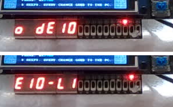 Two photos of the 7-segment display a second apart, showing 'o dE10' and then 'E10-LI': the message scrolling.