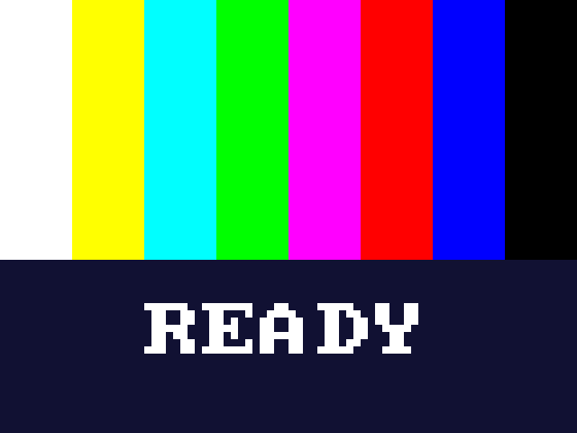 The expected screen: eight colour bars on top (white, yellow, cyan, green, magenta, red, blue, black) and the word READY in big white letters below, on dark blue.